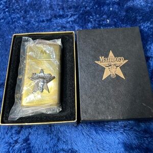 Marlboro solid brass zippo Lighter with brass Star. Brand new in box.
